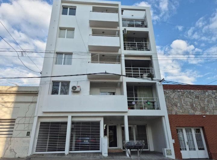 Departamento de un dormitorio con cochera 1